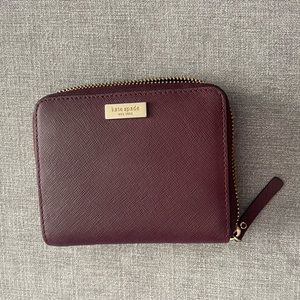 Maroon Kate spade wallet.